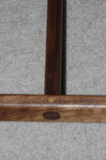  A hardwood dowel pins the handle shaft to the frame
